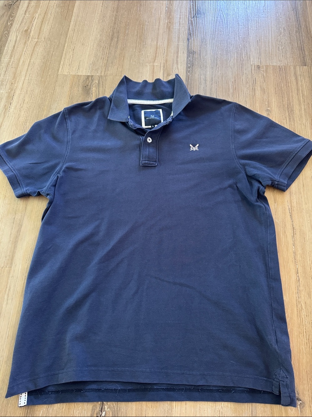 Classic Navy Short-Sleeve Polo with Subtle Chest Emblem